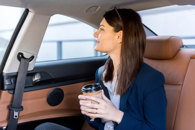 brunette-businesswoman-inside-car
